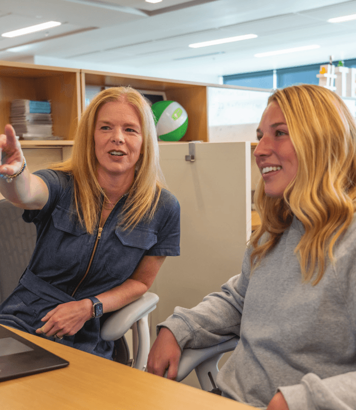 Photo showing two people communicating